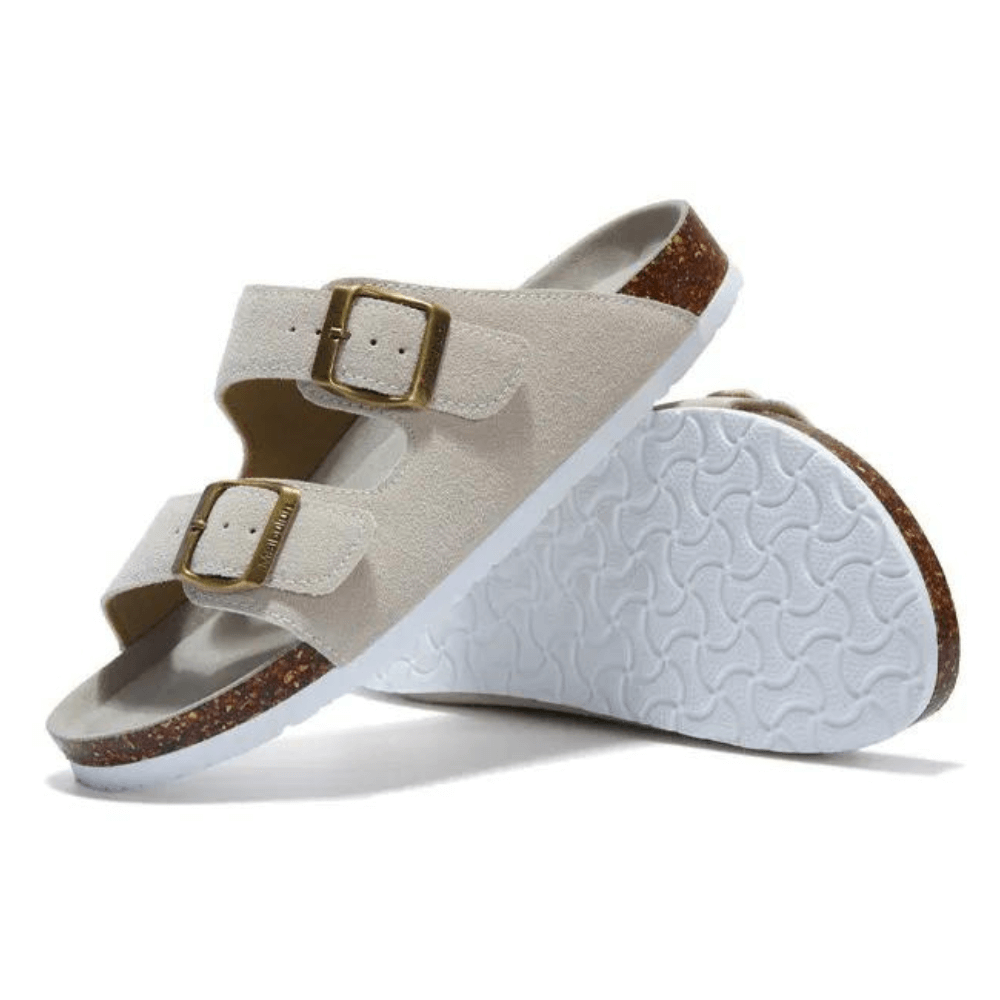 Sandália Birken Camurça, conforto excepcional com design europeu, unindo elegância atemporal e leveza. Perfeita para um estilo sofisticado e moderno.